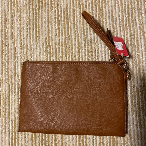 Brown wristlet with zipper details. - Picture 2 of 5